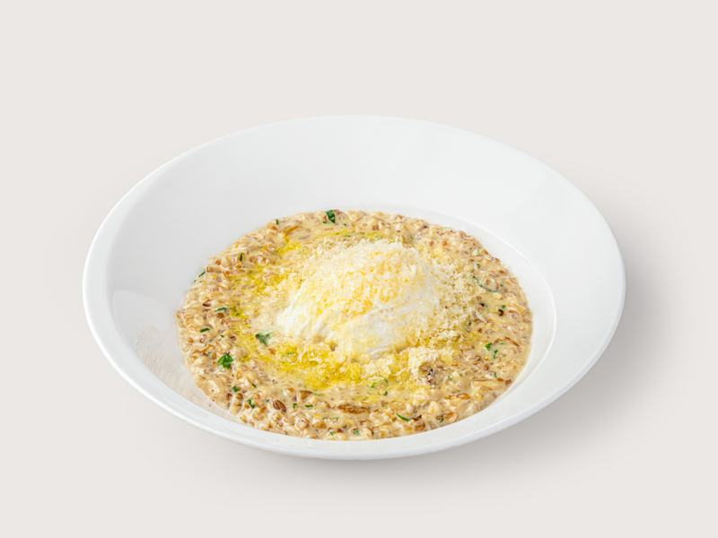 Злаковая каша с белыми грибами и пармезаном